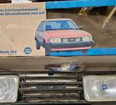 Hella Grill inkl Anbau Material Fernscheinwerfer H2 Mazda 323 Ab Bj 06/1980 1FB004120811 1FB004120-811 301125-098 301-125098 301125098 34405R8