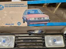 Hella Grill inkl Anbau Material Fernscheinwerfer H2 Mazda 323 Ab Bj 06/1980 1FB004120811 1FB004120-811 301125-098 301-125098 301125098 34405R8